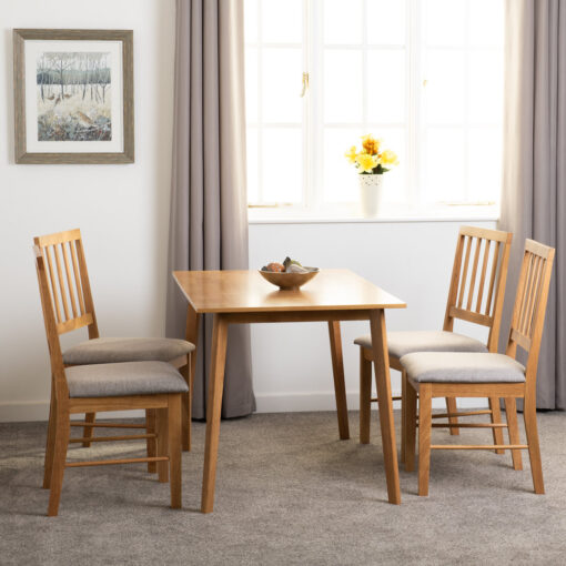 Aine 4 - Person Rubberwood Solid Wood Dining Set