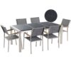 Beliani - 6 Seater Garden Dining Set Triple Granite Top Grey Chairs Grosseto