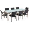 Beliani - 8 Seater Garden Dining Set Cracked Ice Glass Top Black Rattan Chairs Grosseto