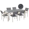 Beliani - 6 Seater Garden Dining Set Black Flamed Triple Granite Top Grey Chairs Grosseto